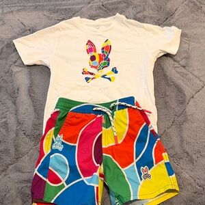 Psycho Bunny Black Logo Label on Yellow-Trim Garment